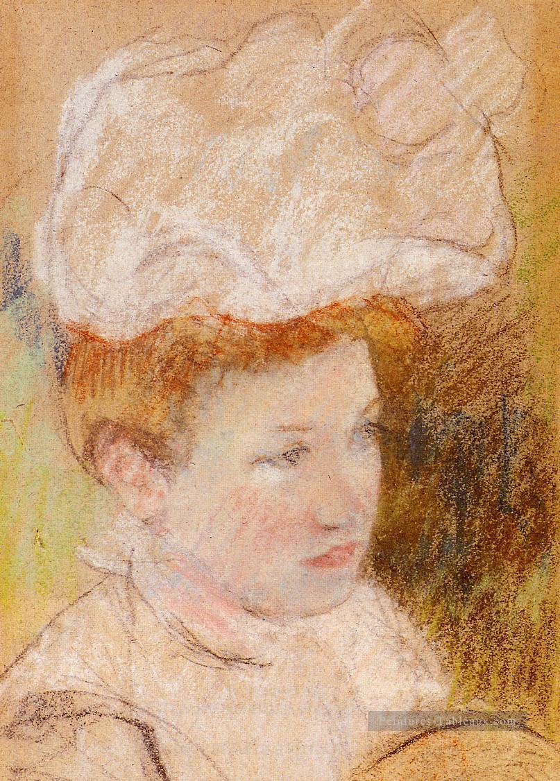 Léontine dans un chapeau en peluche rose mères des enfants Mary Cassatt Peintures à l'huile
